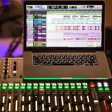 Audio mixing board with laptop for sound production at live events in San Diego